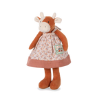 Plush cow toy with a dress on a white background
