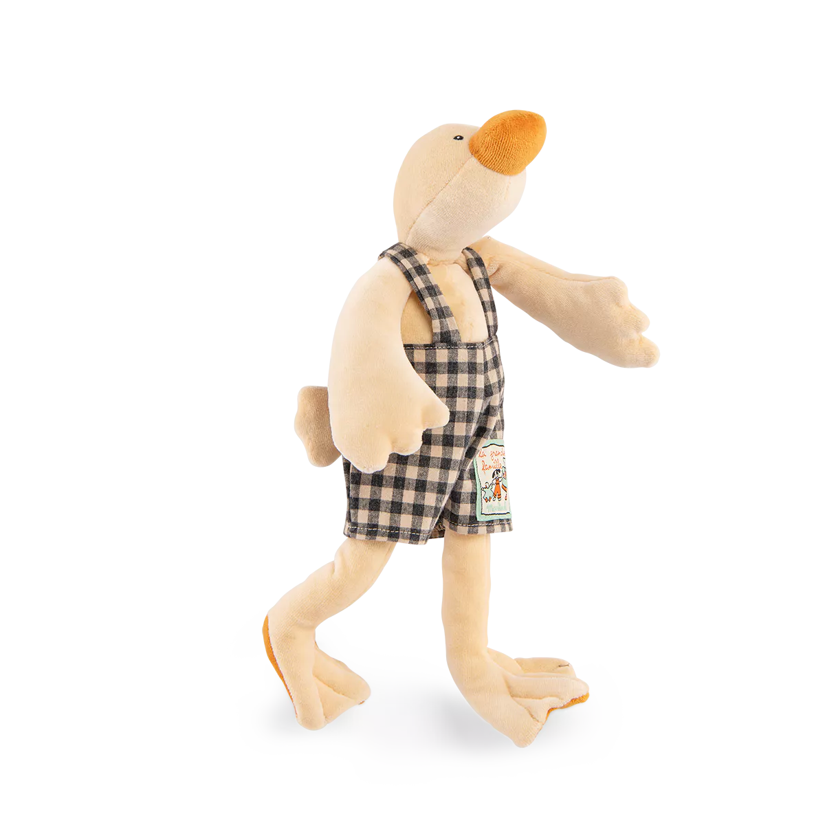 Plush toy duck wearing checkered overalls on a white background