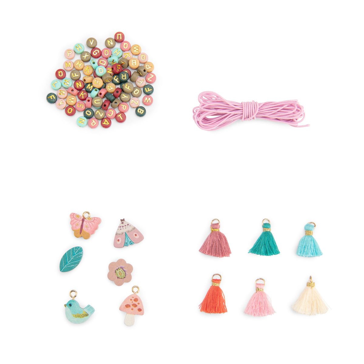 Assorted colorful charms and tassels on a white background