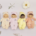 Four dolls in colorful onesies with butterfly accents on a light background.