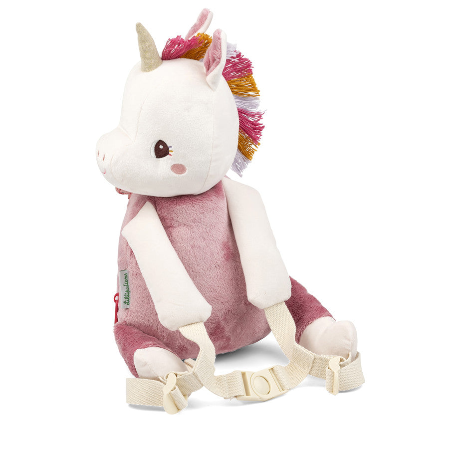 Plush unicorn backpack with a harness on a white background