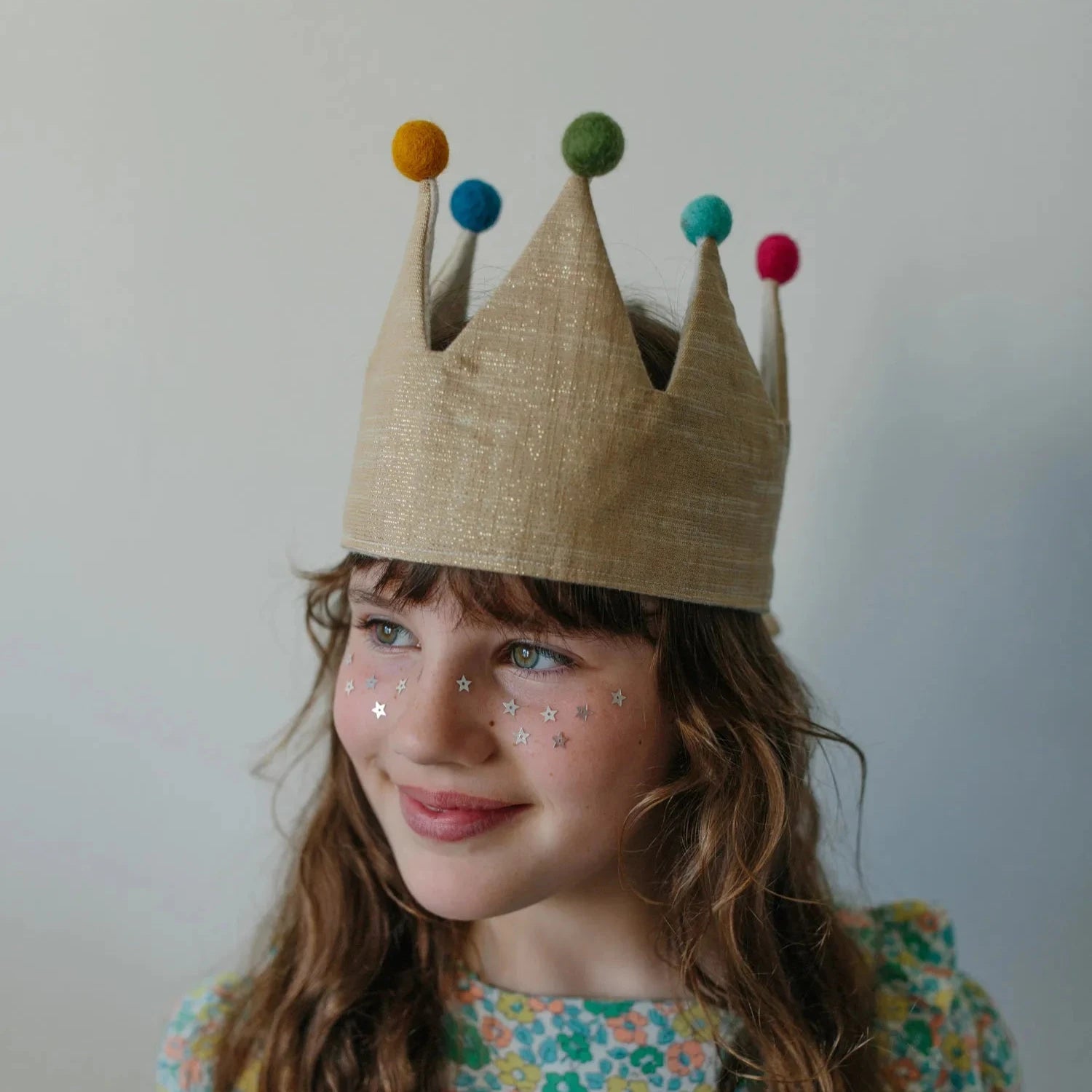 girl wearing christmas crown 