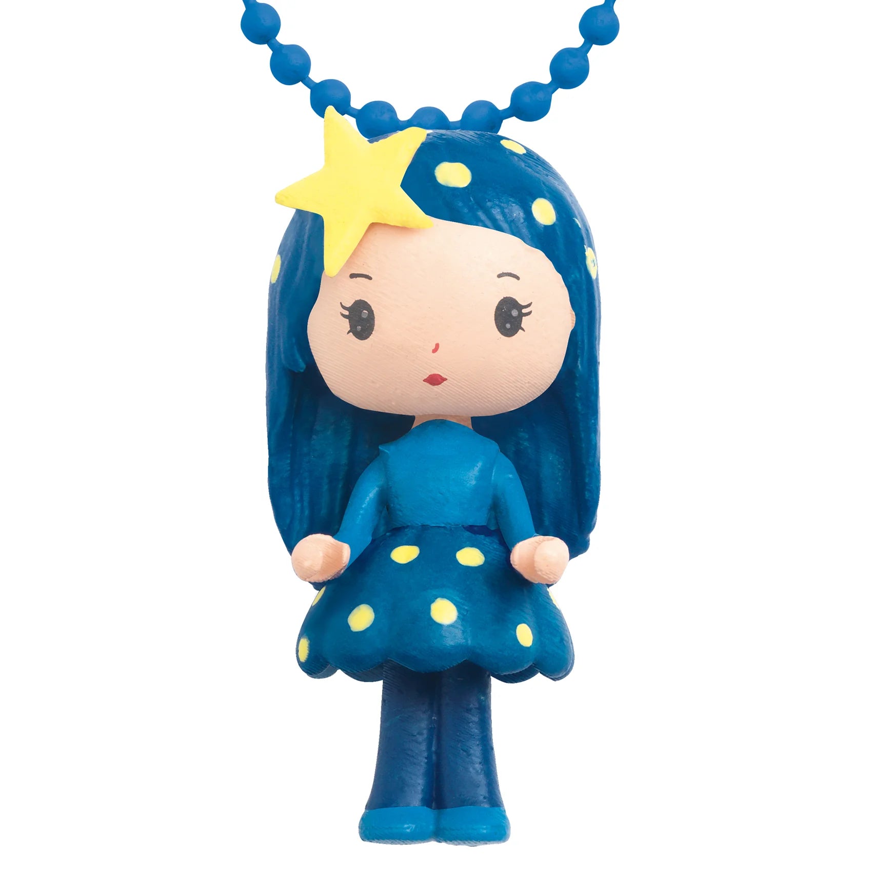 Toy figure with blue hair and dress on a white background
