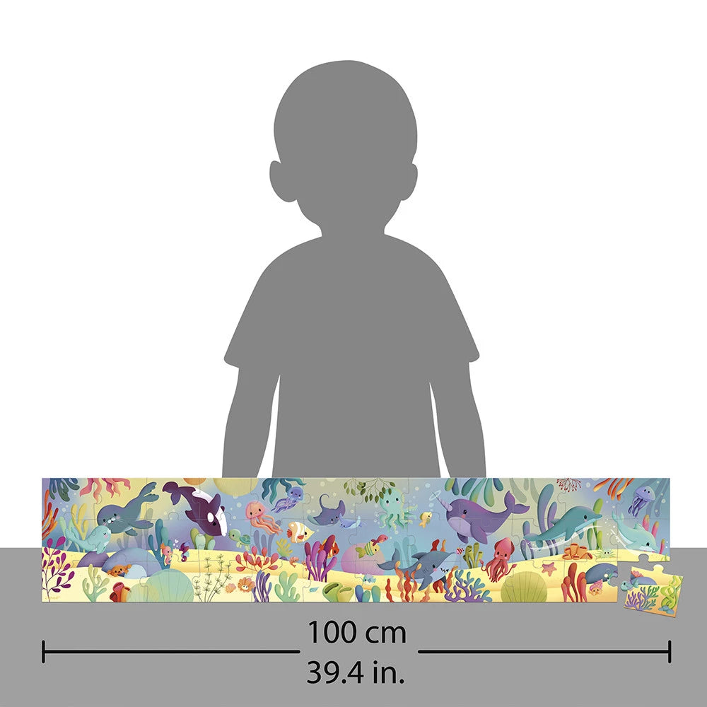 jigsaw with an underwater-themed border and a child's silhouette for scale.