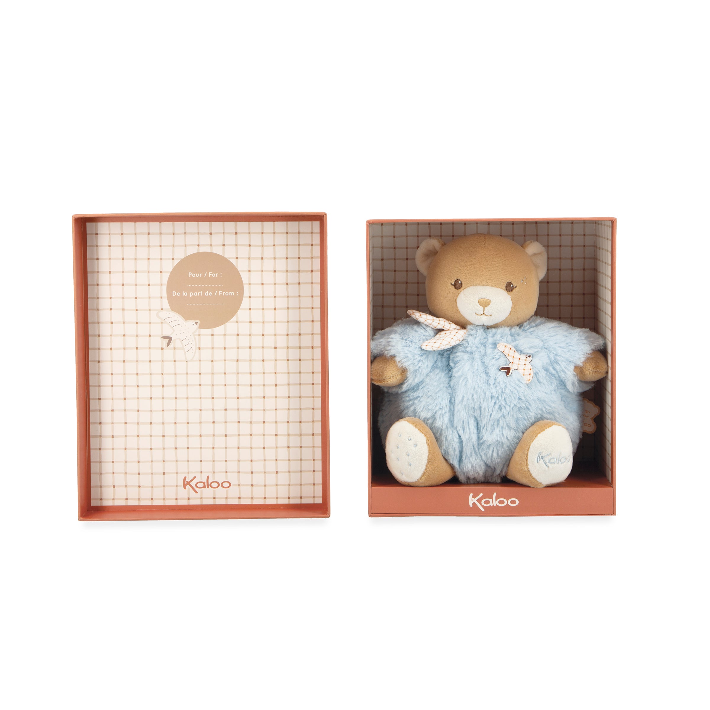 Teddy bear in a blue outfit with 'Kaloo' branding on a white background