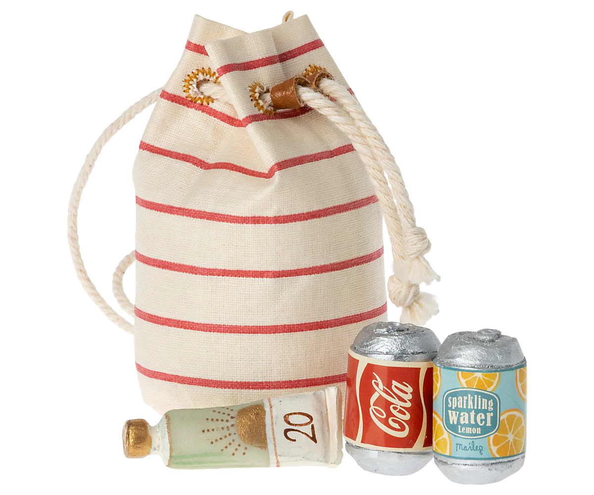 Drawstring bag with vintage-style Coca-Cola and sparkling water cans on a white background
