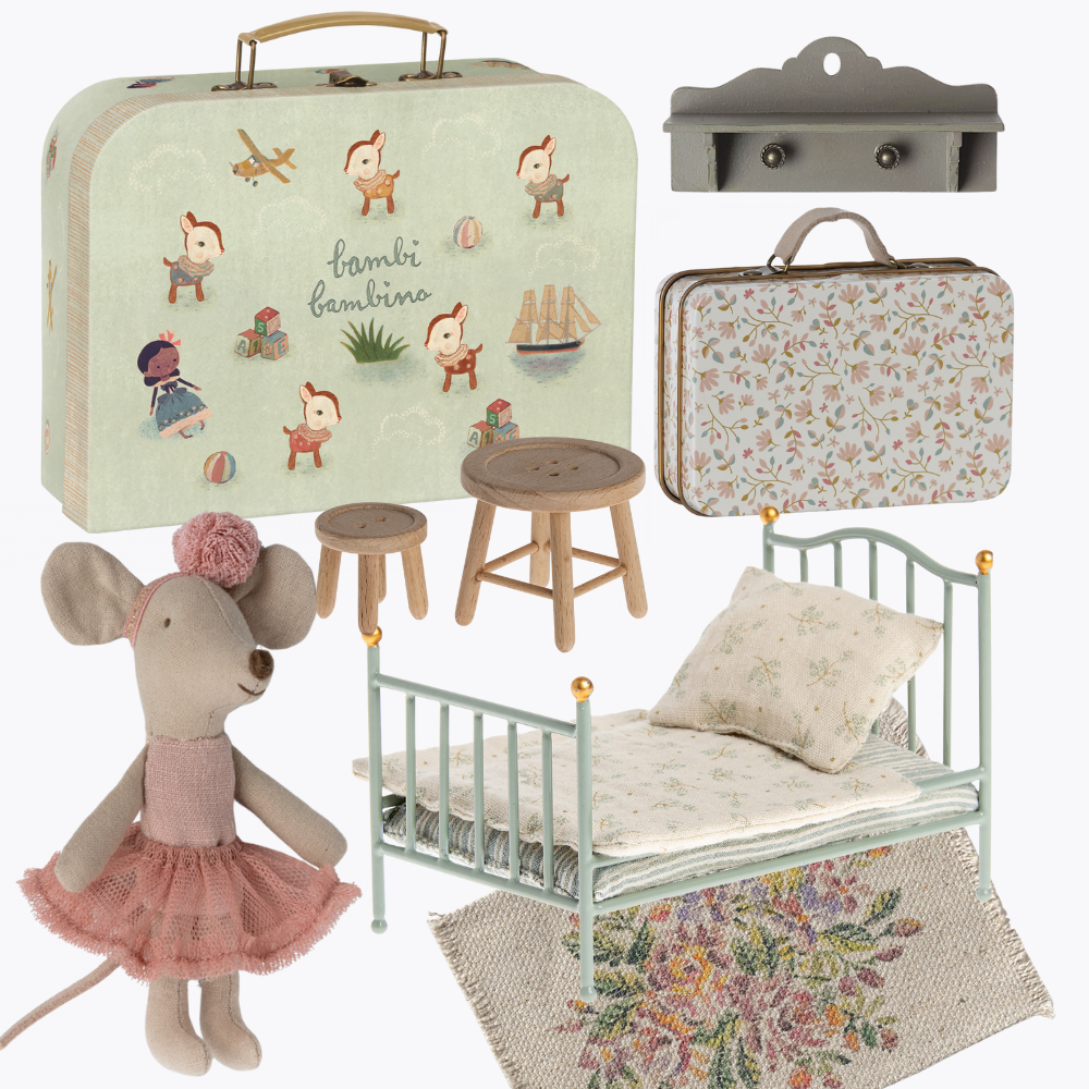 Collection of dolls house furniture and toys including a suitcase, bed, and mouse doll.