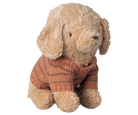 Stuffed dog toy wearing a knitted sweater on a white background