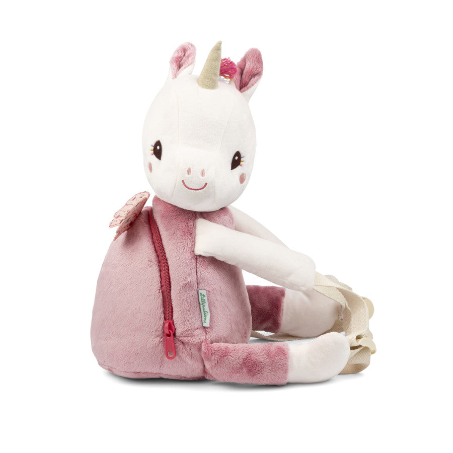 Plush unicorn childrens backpack with pink accents on a white background