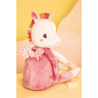 unicorn soft back with a colorful mohawk on a yellow background